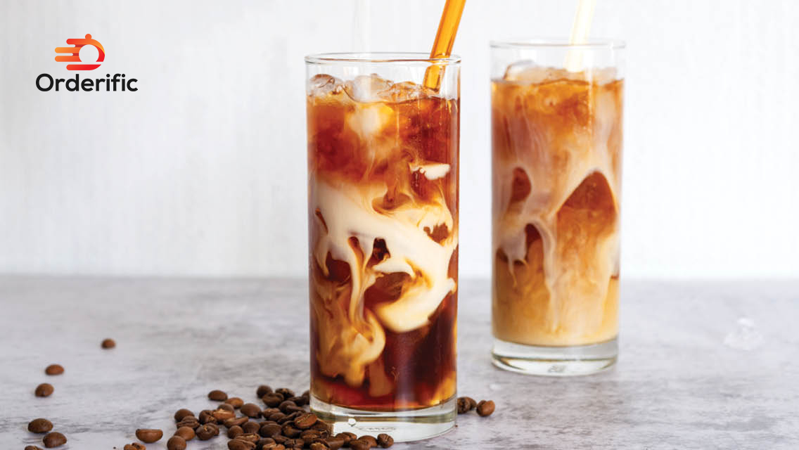 cold brew served in chilled glasses with milk